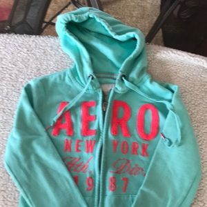 Aqua  zip up hoodie.